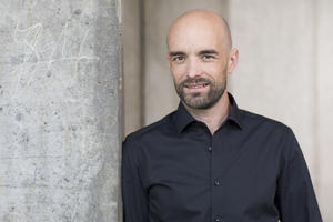 Portraitfoto des Moderators Lars-Henning Metz